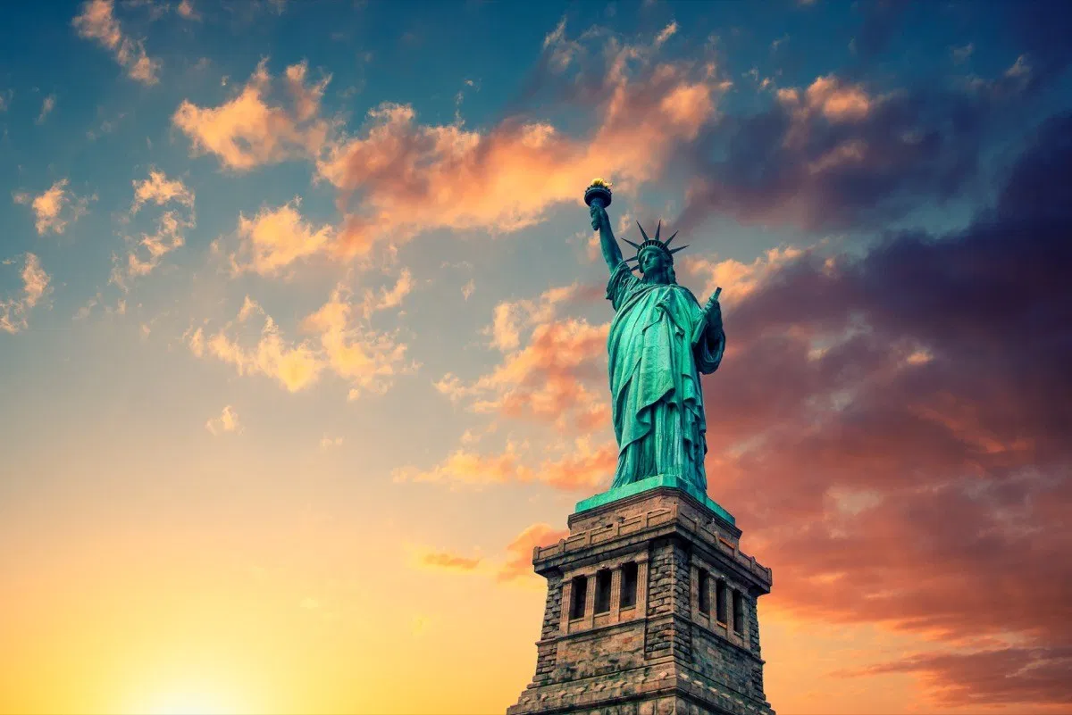 statue of liberty at sunset